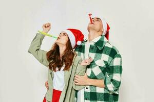 man and woman looking up holiday christmas fashion studio fun photo