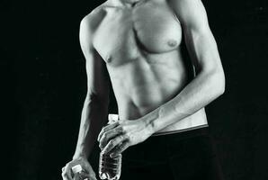athletic man with a pumped-up body black and white photo male exercise