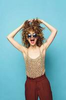 Beautiful woman curly hair emotions sunglasses studio fashion clothes photo