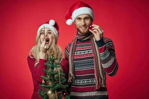 a man and a woman in New Year's clothes Christmas decorations holiday photo