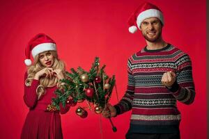 cheerful young couple christmas clothes holiday decorations toys photo
