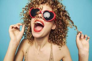 woman Wide open mouth and glasses curly hair photo