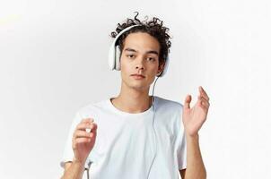 guy in white t-shirt with headphones music lifestyle photo