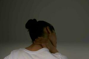 Woman with neck pain photo