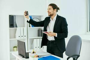 office worker at the desk documents communication by phone Lifestyle photo
