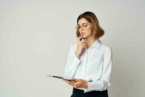 woman in white shirt work documents official professional photo