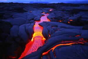 A luminous magma flow in a lava field created with technology. photo