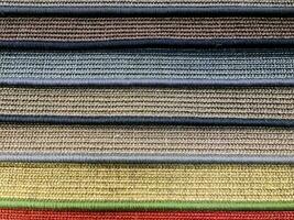 High resolution colorful carpet samples background texture photo