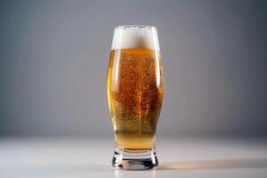 A big glass of beer on a white background created with technology. photo