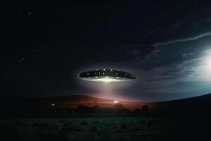 A UFO with a spotlight pointed at the bottom of the landscape - Stars in the sky created with technology. photo