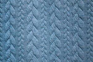 Detailed close up view on samples of cloth and fabrics in different colors found at a fabrics market photo