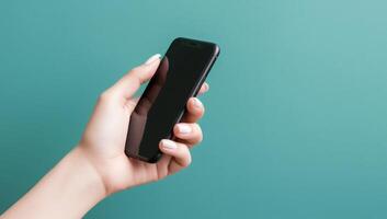 Hands holding smartphone with blue background photo