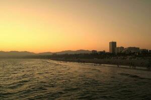 Santa Monica coast in California at sunset photo