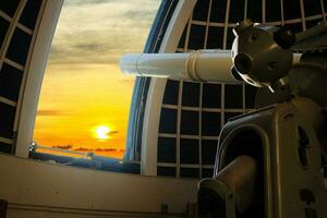 Telescope of Griffith Observatory, with a beautiful sunset photo