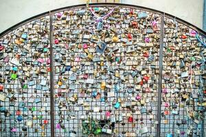 Love locks on a wall in Verona photo