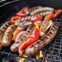 Grilled sausages and vegetables on a flaming BBQ grill. A delicious food poster for summer dining. photo