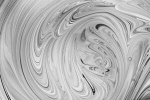 Black and white waves on gray fusion of colors. Fluid Art. Abstract marble background or texture photo