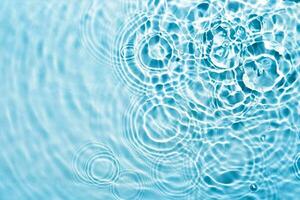 Abstract transparent liquid background with concentric circles and ripples. Spa concept. Soft focus photo