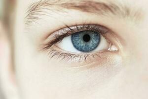 Blue eye Macro. Children's eye close-up photo