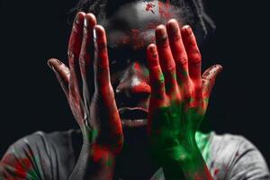 decimonoveno independencia día concepto. negro hombre cubierta su cara con su palmas rojo, verde, negro colores. generativo ai ilustración foto