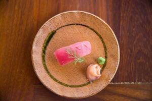 Fresh tuna sushi with ginger and wasabi photo