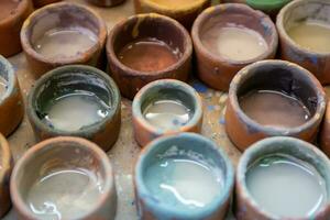 Peruvian paint cups photo