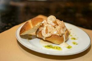 Shrimp Bisque in a bread bowl photo