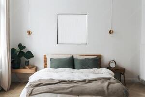 Perfectly made bed with a picture frame above. Bright room . photo