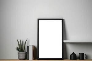 Frame Mockup on kitchen white picture frame with a thin black border sits on top of a wooden bookshelf . photo