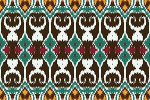 African Ikat fabric paisley embroidery background. geometric ethnic oriental pattern traditional. Ikat Aztec style abstract vector illustration. design for print texture,fabric,saree,sari,carpet.