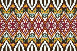 African Ikat fabric paisley embroidery background. geometric ethnic oriental pattern traditional. Ikat Aztec style abstract vector illustration. design for print texture,fabric,saree,sari,carpet.