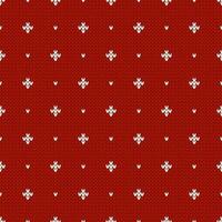 Winter knitted pattern with rhombs and dots. Holiday vector background.