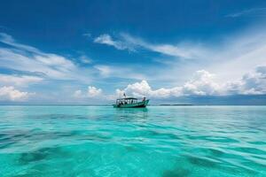 Seascape with boat near beach. The floating boat on blue sea at sunny day. photo