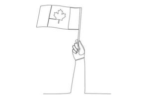 A hand holding up the Canadian flag vector