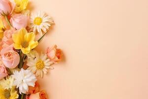 Spring flowers bouquet on pastel background top view in flat lay style. photo