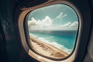 View of the beach and sea the airplane window. Travel and tourism concept. photo