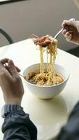 Spaghetti with shrimp in white plate on the table photo