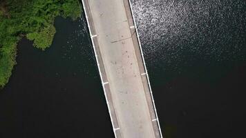 The Bridge over the Ping River. Aerial view of the traffic on the bridge over the river. video