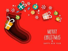 Merry Christmas and Happy New Year greeting card design with gift boxes, candy, baubles and snowflake decorated on red socks shape in paper cut style background. vector