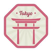 tokio sello o pegatina diseño con torii portón con rayos en hexágono antecedentes en rosado y gris color. vector