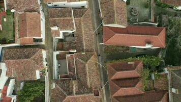 Aerial Top View Of Tiled Roof Houses In The Medieval Town Of Obidos Portugal - aerial drone shot video