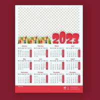 12 Months, 2023 Wall Calendar Template Design With Space For Message Or Image Against Red Background. vector