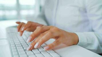 Female hands typing on a computer keyboard. Concept of remote work video