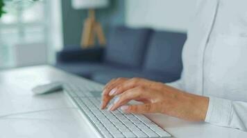 Female hands typing on a computer keyboard. Concept of remote work video