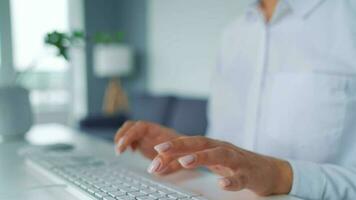 Female hands typing on a computer keyboard. Concept of remote work video