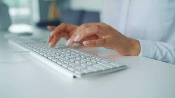 Female hands typing on a computer keyboard. Concept of remote work video