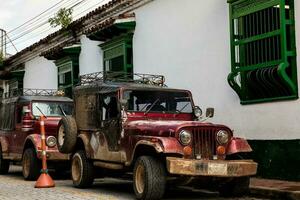 Traditional off road vehicle used for the transport of people and goods in rural areas in Colombia photo