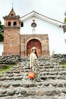 Beautiful young woman at the historical San Antonio Church located in the city of Cali in Colombia photo