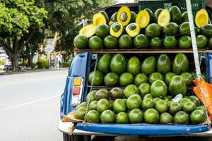 Street sell of avocado at an old car at El Cerrito on the Valle del Cauca region in Colombia photo