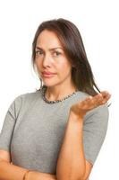 Young caucasian woman with inquisitive expression isolated on white background photo